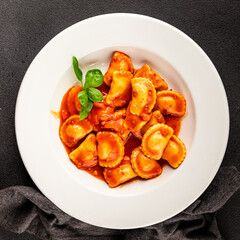 Ravioli beef tomato sauce second course fresh delicious gourmet food background on the table rustic food top view copy space