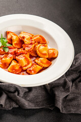 Ravioli beef tomato sauce second course fresh delicious gourmet food background on the table rustic food top view copy space