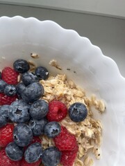 Healthy breakfast with berries and oats