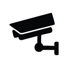 Black silhouette of a surveillance camera mounted on a wall isolated on white background