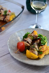 Colorful grilled chicken skewer with vibrant vegetables as a delicious food background. 