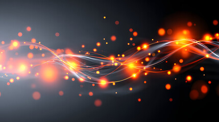 Dynamic abstract image featuring glowing orange particles and swirling light trails against dark background, creating sense of energy and movement