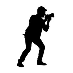 A single white feather floats gently downwards against a completely black background isolated on transparent background