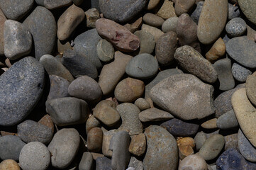 Sea Pebbles Close-Up as Natural Background Texture