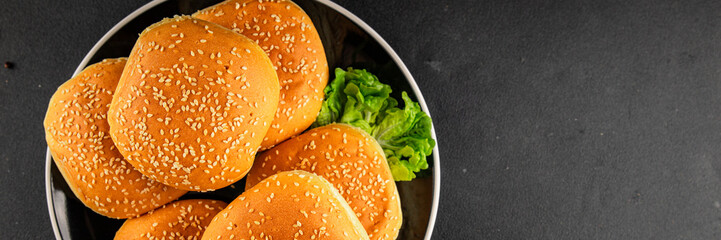 Bun burger puffy soft buns baking fresh delicious gourmet food background on the table rustic food...
