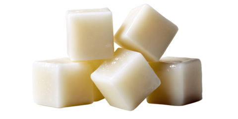 Pile of White Tallow Cubes for Soap Making, Closeup of Rendered Animal Fat for DIY Cosmetics and Candles on Black Background