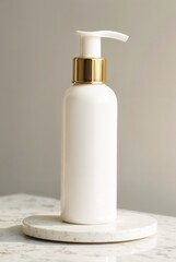 White pump bottle with gold detail on stone surface