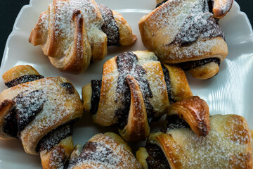 Chocolate and puff pastry croissant. Dessert. Pastry