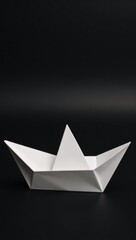 Naklejka premium Ok origami ship crafted from abstract shapes against a dark backdrop