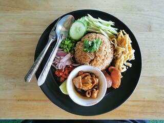 Thai shrimp paste fried rice with sweet pork and side dishes