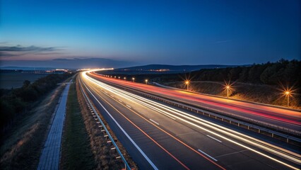 A long exposure shot of a highway at dusk, showcasing vibrant light trails from moving vehicles against a tranquil sky.