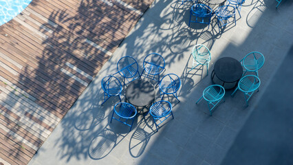 Top View of Poolside Café Chairs from the Second Floor