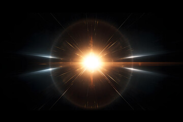 Fototapeta premium Bright golden starburst light flare with lens flares on black background