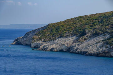 Fototapeta premium Caves of Zakynthos, Greece – Coastal Rock Formations and Crystal Waters