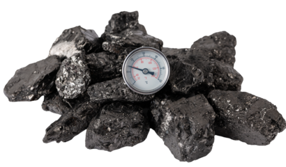 A pile of fossil fuels in the form of coal with a low heat thermometer.