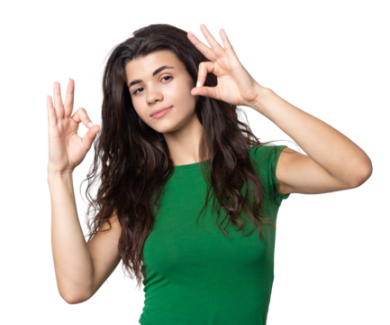 Smiling girl gesturing OK sign with her hand