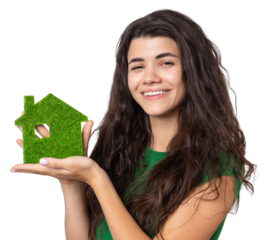 Happy house buyer. A young girl holds a model of a green house in her hands. The concept of green energy, ecology.