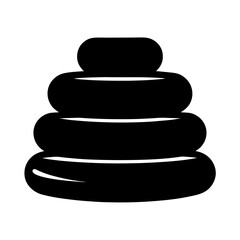 Stylized zen stone stack of four smooth rocks balanced on top of each other