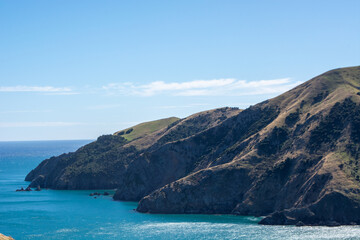 Scenic Coastal View with Rugged Hills and Turquoise Waters