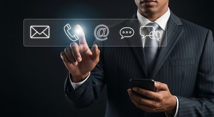 Businessman selects communication icons on a futuristic screen