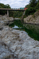 Serene River with Bridge and Train