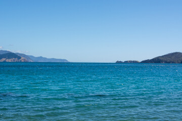 Serene Ocean View Under Clear Blue Sky