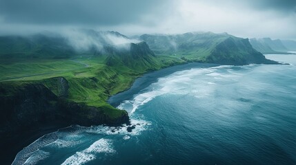 Fototapeta premium Misty Coastline: An Aerial View of Iceland's Dramatic Landscape