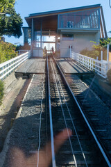 Scenic Railway Track Leading to Modern Building