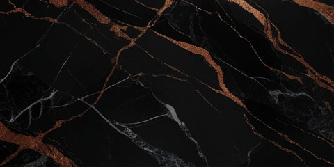 Luxurious marble texture with a predominantly black background and flowing patterns with golden veins running through it, creating a striking contrast.