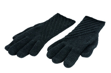 Green woolen gloves isolated on white background. Knitted woolen gloves.