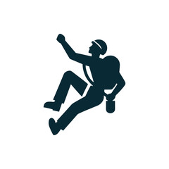 Silhouette of a climber ascending a rocky face, showcasing determination and adventure