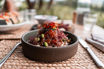 Modern seafood brunch menu items with mexican and japanese influence. Ceviche and poke bowl.