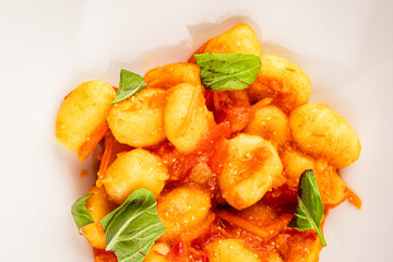 Gnocchi tomato sauce fresh delicious gourmet food background on the table  rustic food top view copy space