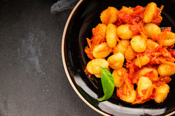 Gnocchi tomato sauce fresh delicious gourmet food background on the table  rustic food top view copy space