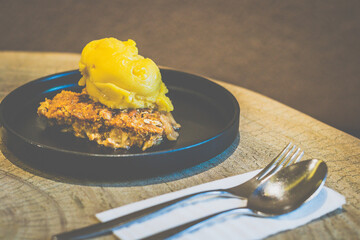 Apple Crumble with Mango Sorbet
Granny Smith apple crumble with warm, spiced filling and a crisp...