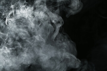 Hookah smoke on black background, closeup. Space for text