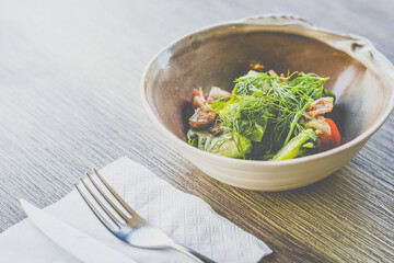 Brussel Sprouts with Bacon Bits served in a bowl on a table
