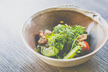 Brussel Sprouts with Bacon Bits served in a bowl on a table