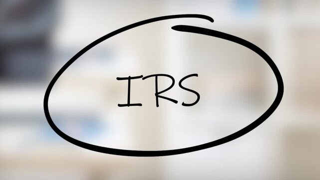 IRS Handwriting using black marker on glass