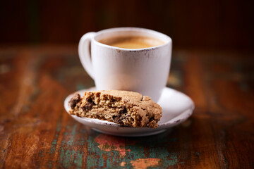 Cup of coffee on wooden background. Soft focus. Copy space	