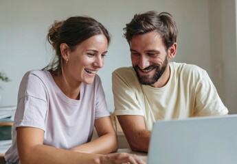 Teamwork in a Cozy Home Office Young Professionals Collaborating in a Digital Environment