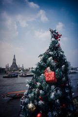 a Christmas tree and wat Arun temple in Bangkok Thailand