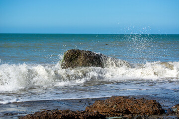 Waves Crashing on Rocky Shoreline