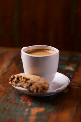 Cup of coffee on wooden background. Soft focus. Copy space	