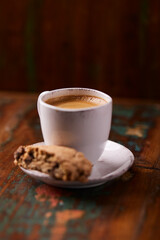 Cup of coffee on wooden background. Soft focus. Copy space	