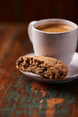 Cup of coffee on wooden background. Soft focus. Copy space	