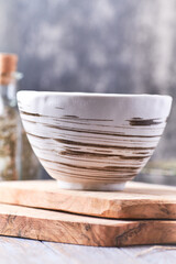 Traditional, handcrafted ceramic on stone background.	