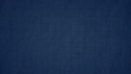 Dark indigo woven textile background provides a sense of depth and texture perfect for contemporary designs