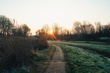 Sunrise over the lake, foggy morning. Dolina Slużewiecka, Warsaw, Poland