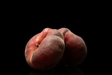 Sweet fig peaches isolated on black background, macro.